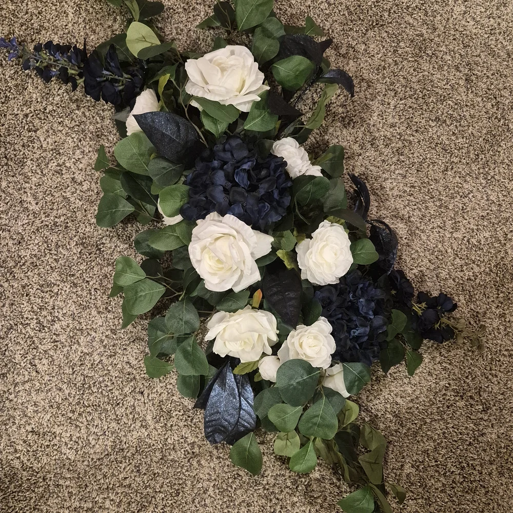 Elegant Floral Arrangement with White and Blue Accents